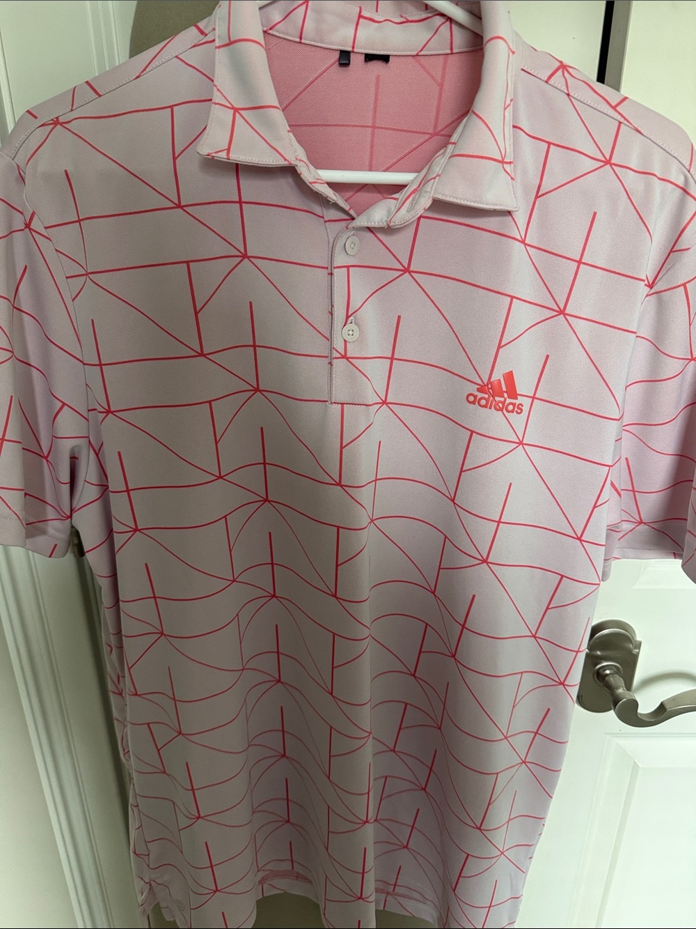 adidas Men’s Light Pink Polo with Coral Geometric Print